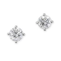 TIFFANY & CO, A PAIR OF DIAMOND STUD EARRINGS in platinum, each set with a round brilliant cut