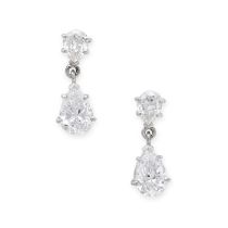 A PAIR OF DIAMOND DROP EARRINGS in 18ct white gold, each set with a pear cut diamond suspending a