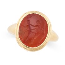 A CARNELIAN INTAGLIO RING in high carat yellow gold, set with a carved carnelian intaglio