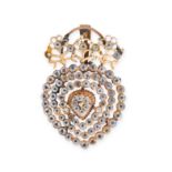 AN ANTIQUE PASTE PENDANT in yellow gold, designed as a heart surmounted by a foliate motif, set