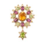 AN ANTIQUE ZIRCON, PERIDOT AND GARNET BROOCH / PENDANT in yellow gold, set with a central oval cut