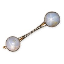 FABERGE, AN ANTIQUE STAR SAPPHIRE AND DIAMOND BAR BROOCH in yellow gold and silver, set with two