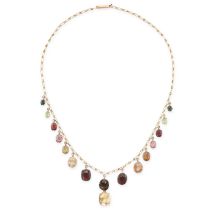 AN ANTIQUE GEMSET HARLQEUIN NECKLACE in yellow gold, the chain suspending a fringe of sixteen
