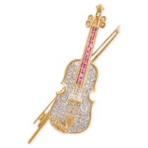 A DIAMOND AND RUBY VIOLIN AND BOW BROOCH in 18ct yellow gold, designed to depict a violin together