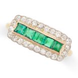 A VINTAGE EMERALD AND DIAMOND RING in yellow gold and silver, set with a row of step cut emeralds