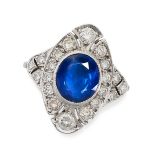 A SAPPHIRE AND DIAMOND NAVETTE RING in 18ct white gold, set to the centre with an oval cut