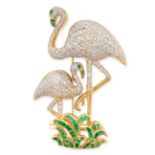 A DIAMOND AND EMERALD FLAMINGO BROOCH in 18ct yellow gold, designed as a pair of flamingos, the