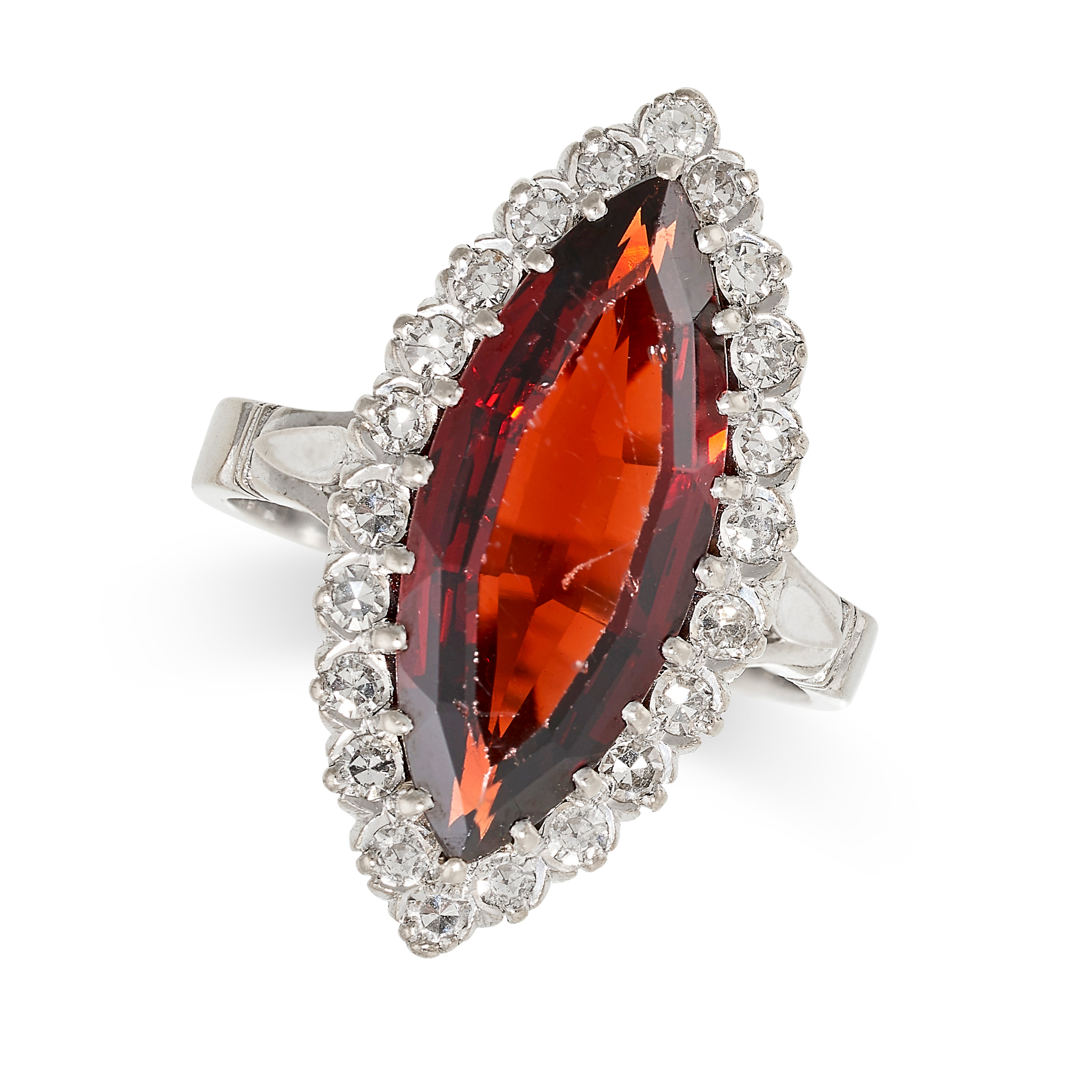 A GARNET AND DIAMOND MARQUISE RING set with a marquise cut garnet in a border of single cut