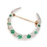 A VINTAGE EMERALD AND DIAMOND CRESCENT MOON BROOCH, 1979  in 9ct white and yellow gold, set with