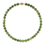 A HYDROGROSSULAR GARNET BEAD NECKLACE comprising a single row of polished green hydrogrossular