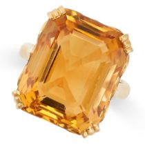 A VINTAGE CITRINE RING in 22ct yellow gold, set with an emerald cut citrine of 25.32 carats, stamped