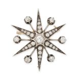 AN ANTIQUE DIAMOND STAR BROOCH / PENDANT, 19TH CENTURY in yellow gold and silver, designed as a