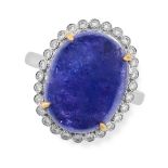 A TANZANITE AND DIAMOND CLUSTER RING in 18ct white gold, set with a cabochon tanzanite of 14.78