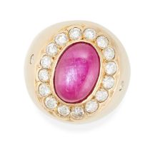 A RUBY AND DIAMOND COCKTAIL RING in 9ct yellow gold, set with a cabochon ruby of 5.60 carats, in a