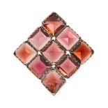 AN ANTIQUE GARNET BROOCH in yellow gold, the square face set with a series of square step cut