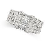 A DIAMOND DRESS RING in 18ct white gold, set with four baguette cut diamonds, accented by pave set