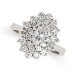 A DIAMOND CLUSTER RING in 18ct white gold, set with a marquise cut diamond of 0.50 carats, in a
