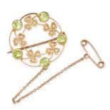 AN ANTIQUE EDWARDIAN PERIDOT AND PEARL WREATH BROOCH in yellow gold, set with round cut peridots and