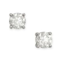 A PAIR OF DIAMOND STUD EARRINGS each set with a round brilliant cut diamond, both totalling 1.4-1.