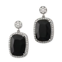 A PAIR OF ONYX AND DIAMOND EARRINGS each comprising a faceted onyx in a border of round brilliant