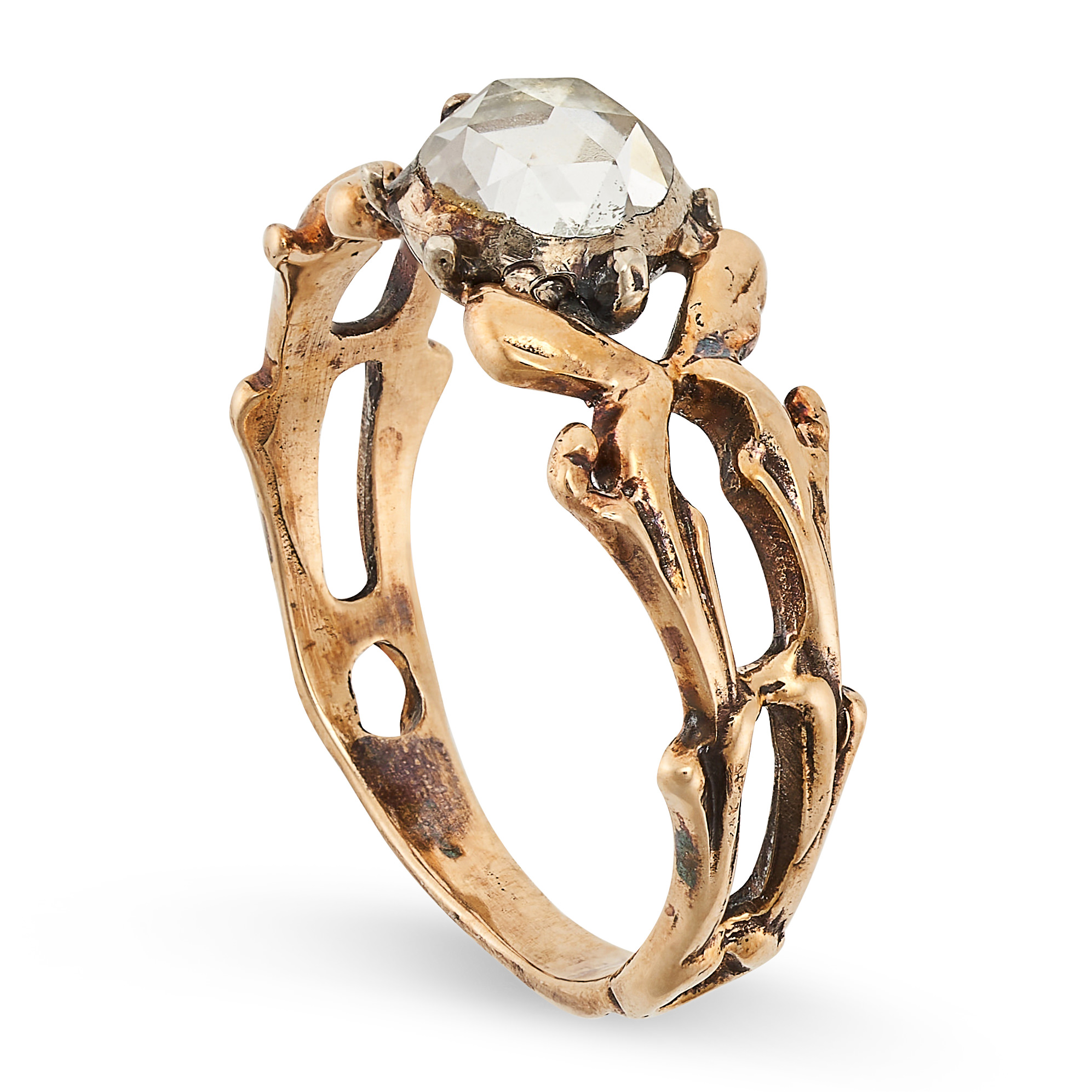 AN ANTIQUE DIAMOND SOLITAIRE in yellow gold and silver, set with a rose cut diamond on a stylised