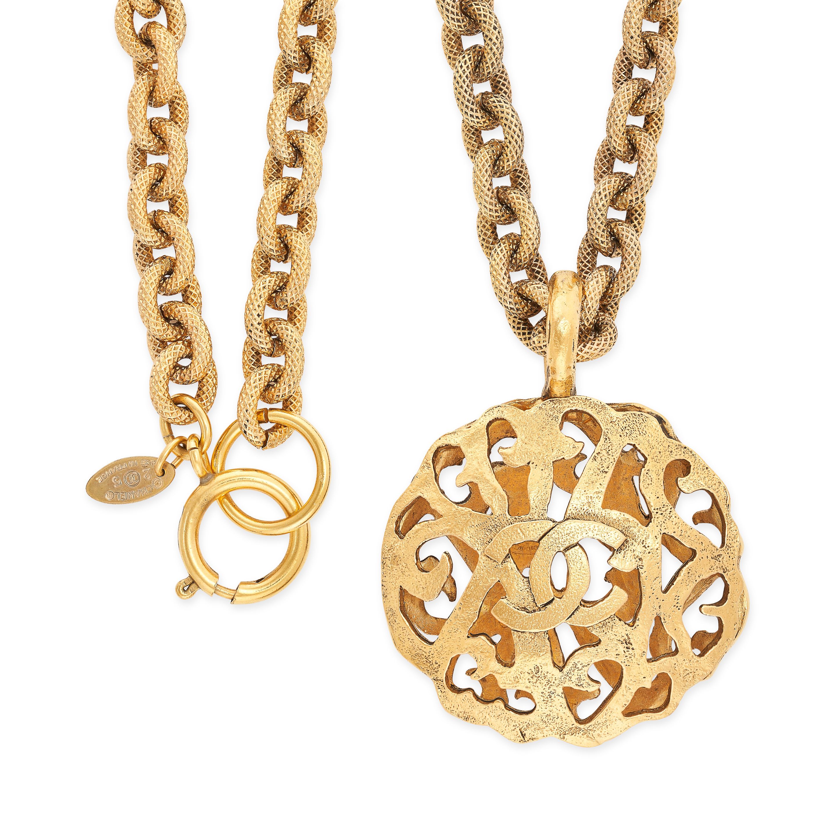 CHANEL, A VINTAGE PENDANT AND CHAIN comprising an openwork pendant with interlocking CC motifs,