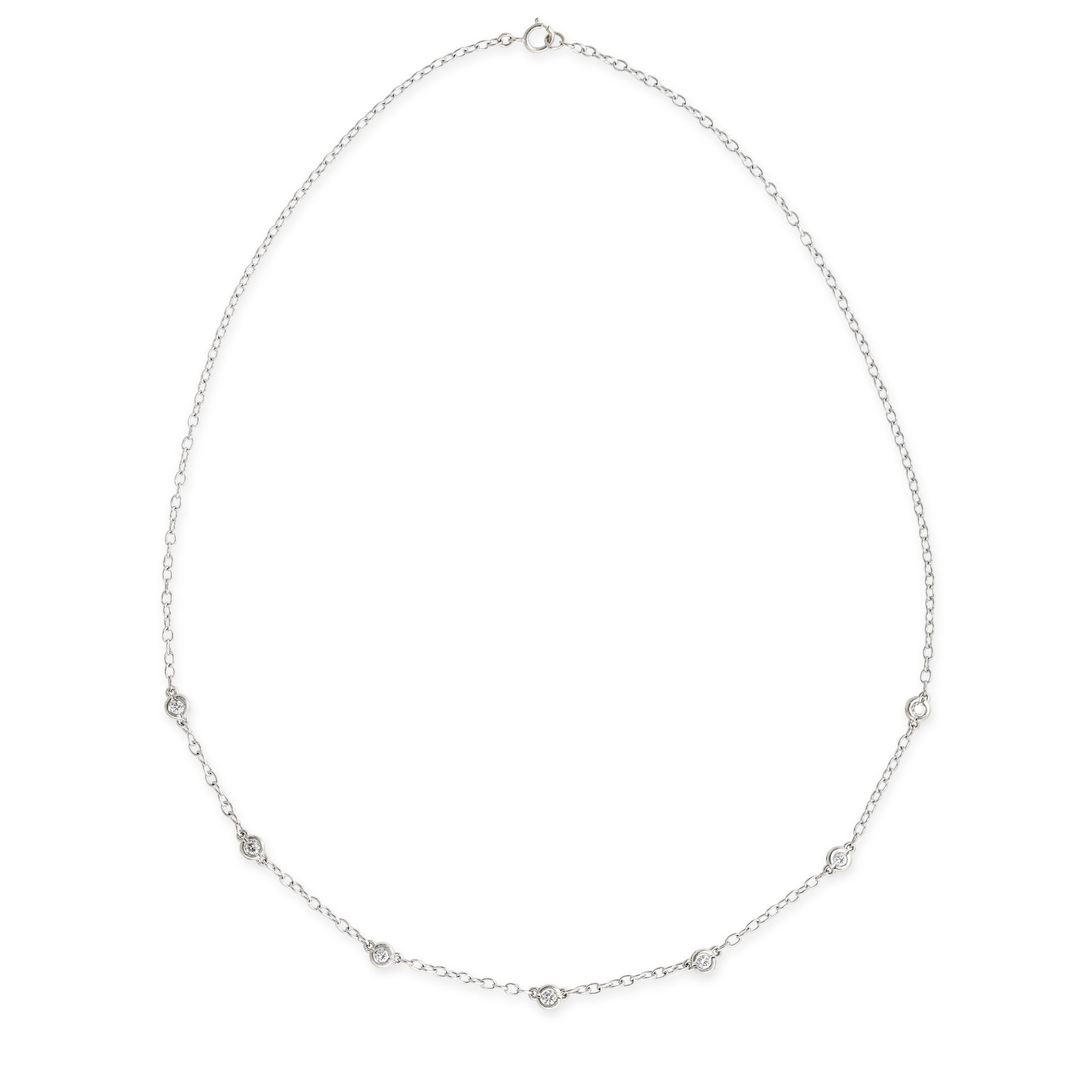A DIAMOND CHAIN NECKLACE comprising a trace link chain set with seven round brilliant cut