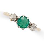 AN EMERALD AND DIAMOND THREE STONE RING set with a cushion cut emerald between two old cut diamonds,