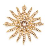 A VINTAGE PEARL SUNBURST BROOCH / PENDANT in 14ct yellow gold, designed as a fifteen rayed sun set