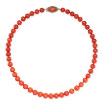A CORAL BEAD NECKLACE comprising a single row of polished red coral beads, the clasp set with a