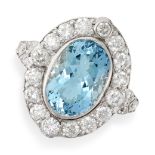 AN AQUAMARINE AND DIAMOND RING set with an oval cut aquamarine of 3.90 carats in a border of round