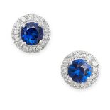 A PAIR OF SAPPHIRE AND DIAMOND CLUSTER EARRINGS each set with a round cut sapphire in a border of