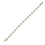 A VINTAGE EMERALD AND DIAMOND BRACELET in yellow gold, set with a row of oval cut emeralds and round