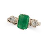 AN EMERALD AND DIAMOND THREE STONE RING in 18ct yellow gold, set with an emerald cut emerald of 1.65