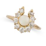 A DIAMOND AND PEARL HORSESHOE RING in yellow gold, comprising a horseshoe motif set with old cut