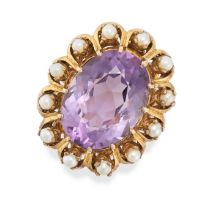 AN AMETHYST AND PEARL RING in 9ct yellow gold, set with an oval cut amethyst in a border of