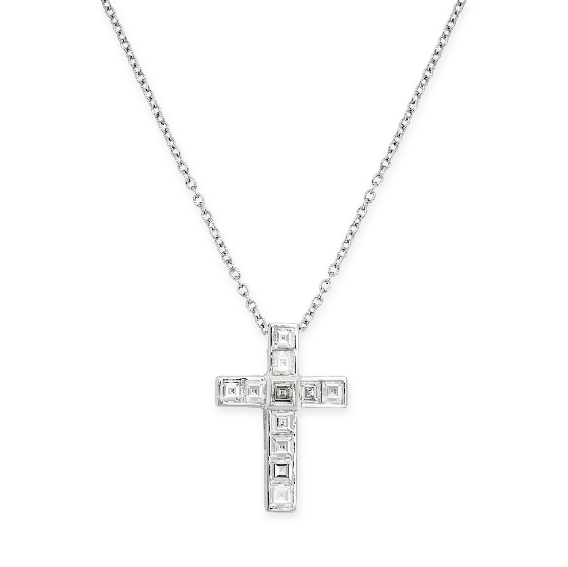 A DIAMOND CROSS PENDANT AND CHAIN in platinum, the pendant designed as a cross set with carre cut