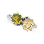 A PERIDOT AND CITRINE TOI ET MOI RING in 18ct white gold, set with a round cut peridot and a round