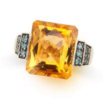 A CITRINE AND BLUE DIAMOND RING in 14ct yellow gold, set with a faceted citrine, the shoulder pave