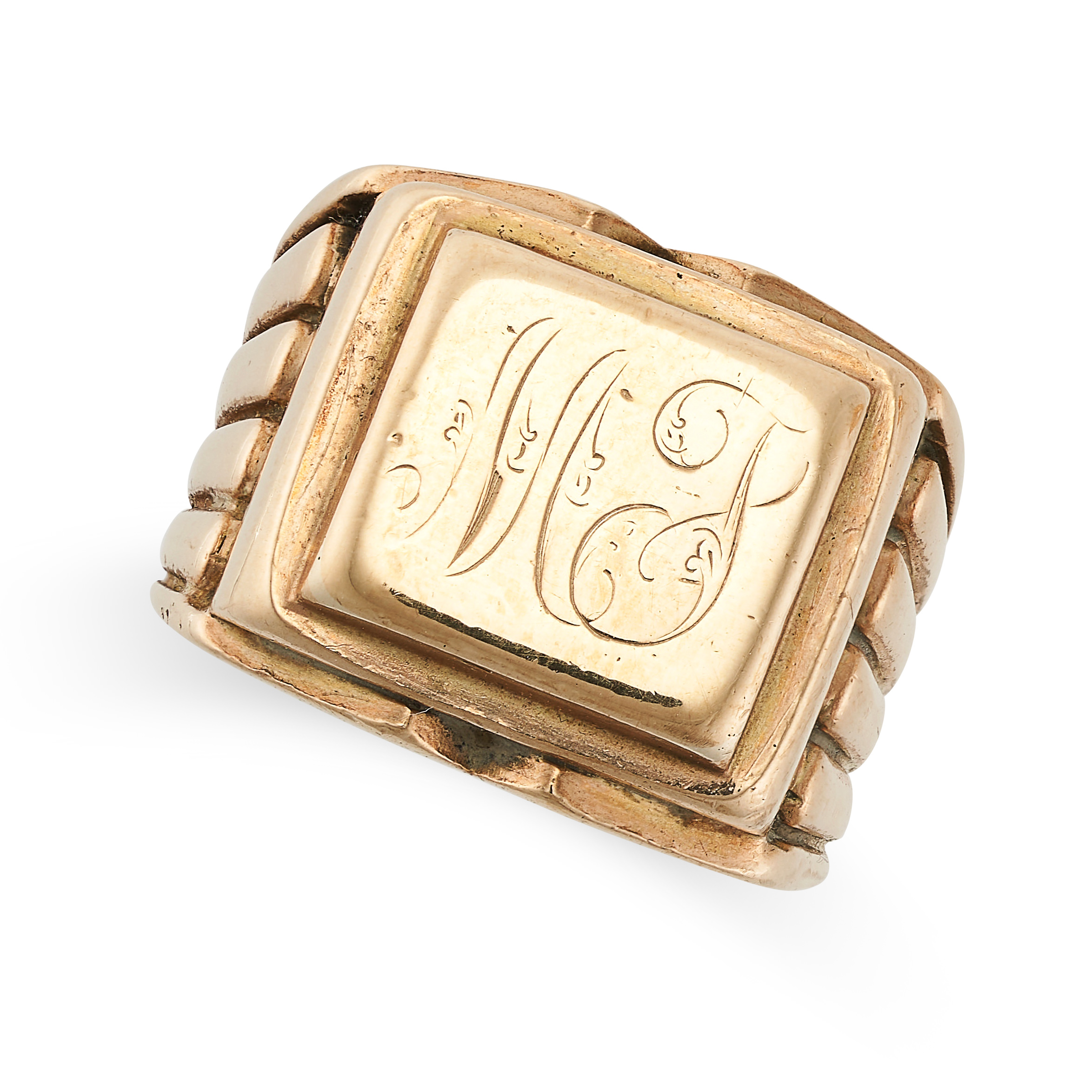 AN ANTIQUE SIGNET RING in yellow gold, the rectangular face engraved with the monogram 'MP',