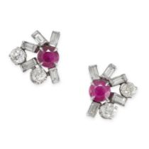 A PAIR OF RUBY AND DIAMOND EARRINGS set with a round cut ruby within a border of old and baguette