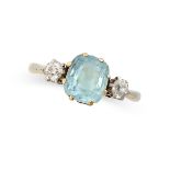 AN AQUAMARINE AND DIAMOND THREE STONE RING in yellow gold and platinum, set with a cushion cut