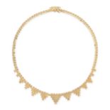 A GOLD FRINGE NECKLACE comprising a series of fancy links with graduated triangular drops formed