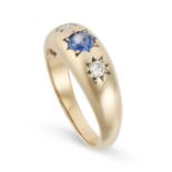 A SAPPHIRE AND DIAMOND GYPSY RING in 9ct yellow gold, set with a round cut sapphire between two