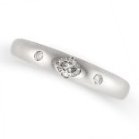 A DIAMOND BAND RING in 18ct white gold, set with an oval cut diamond between two round cut diamonds,