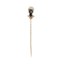 A VINTAGE BLACKAMOOR TIE / STICK PIN in yellow gold, depicting the bust of a man wearing a