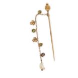 AN ANTIQUE CITRINE, GREEN ZIRCON AND PEARL STICK PIN in yellow gold, set with a cabochon citrine,