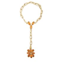 A CITRINE CHAIN RING BRACELET comprising a ring set with a cluster of oval and pear cut citrines and