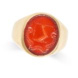 A VINTAGE CARNELIAN SIGNET RING in yellow gold, set with a carnelian intaglio with a coat of arms,