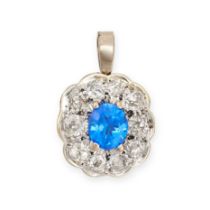A DIAMOND AND BLUE GEMSTONE PENDANT set with an oval cut blue gemstone in a cluster of old cut